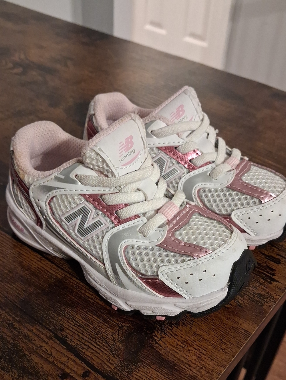 New Balance Kids White and Pink Athletic Sneakers